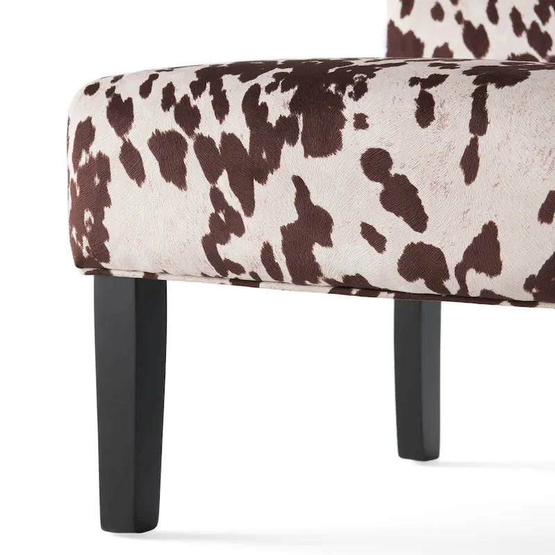Chaise d'appoint contemporaine sans accoudoirs imprimé vache, avec pieds coniques en métal noir mat