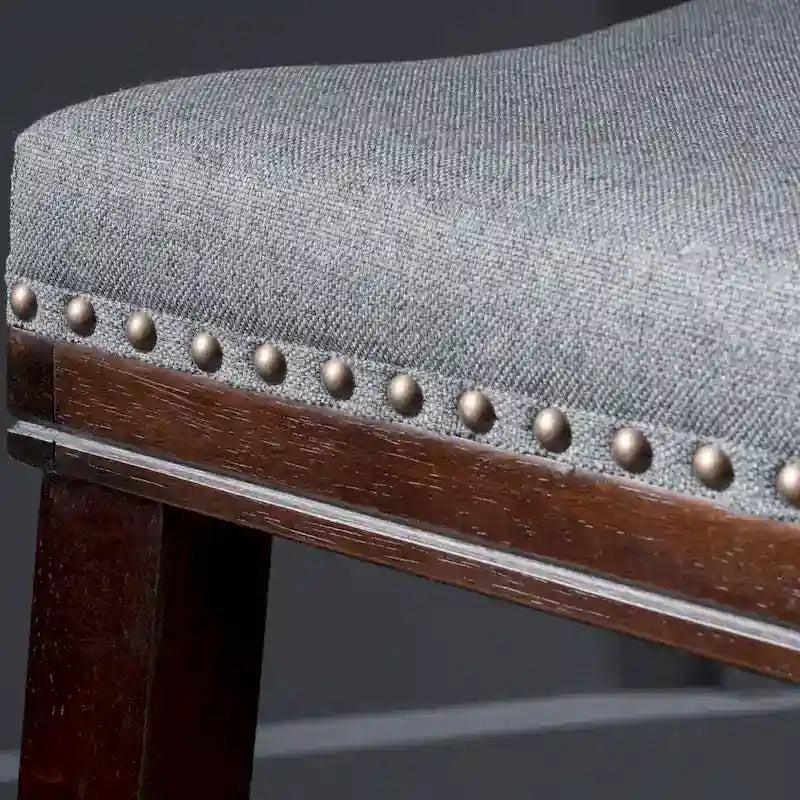 Tabouret de bar contemporain rembourré en forme de selle avec garniture cloutée, pieds marron foncé