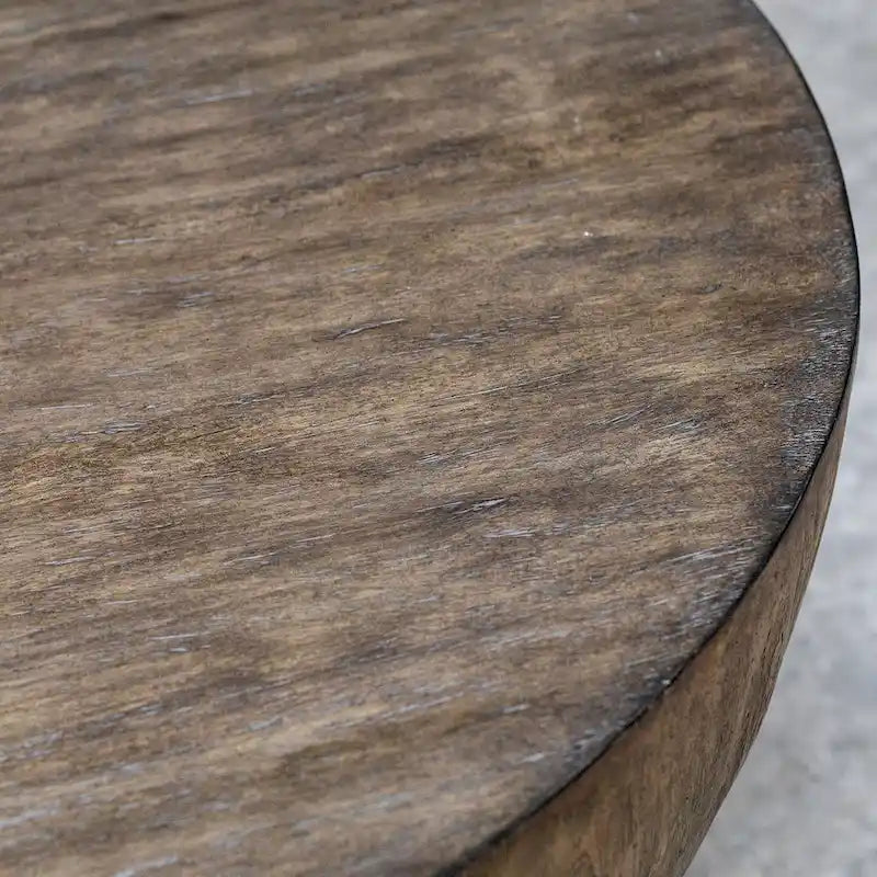 Table basse ronde en placage de noyer finition vieillie