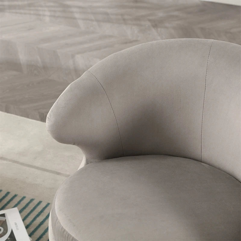 Fauteuil pivotant rond en velours avec base en métal doré
