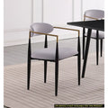 Chaise de salle à manger contemporaine rembourrée avec accoudoirs et structure en métal noir et or