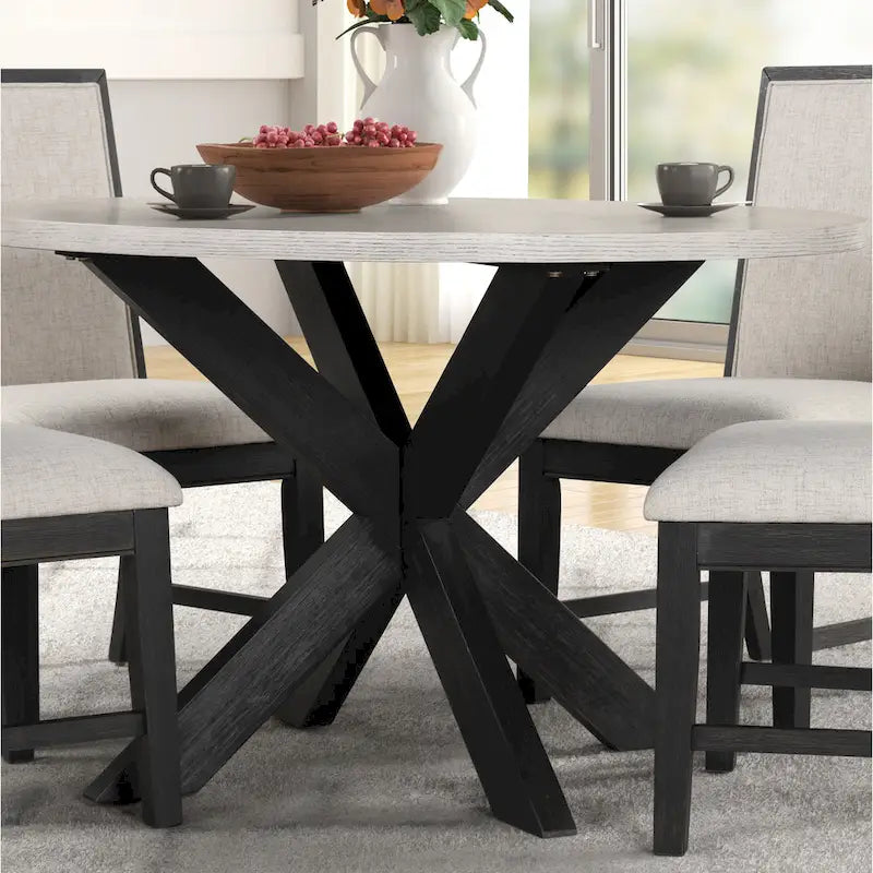 Table à manger ronde avec piètement croisé et plateau en MDF gris clair