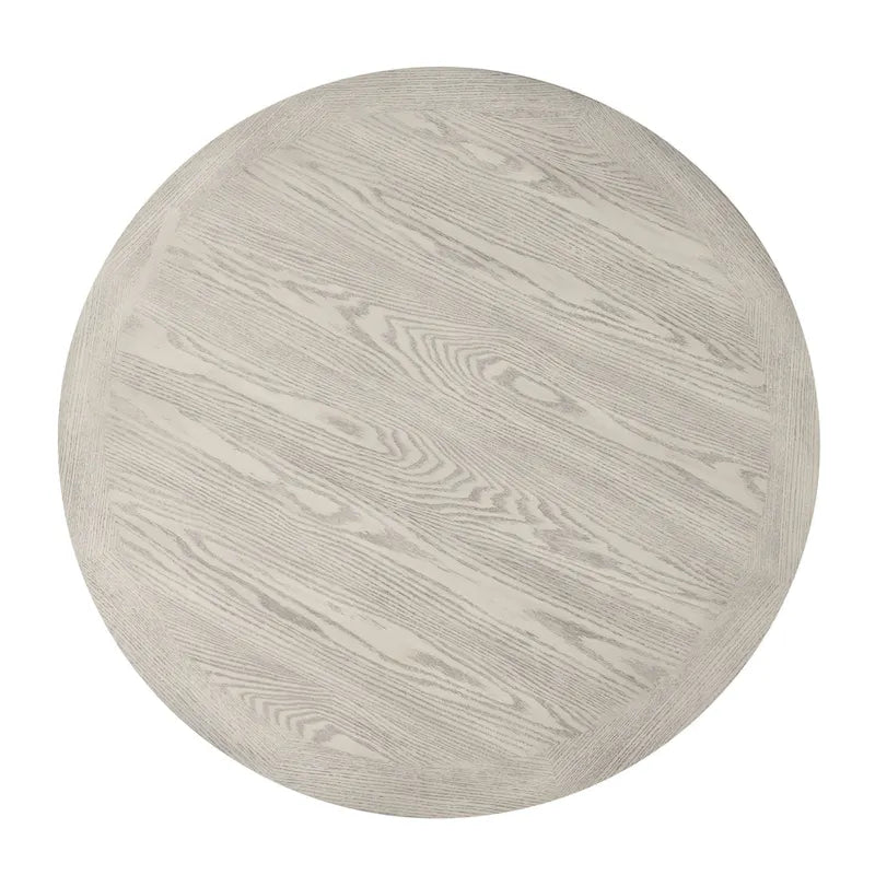 Table à manger ronde avec piètement croisé et plateau en MDF gris clair